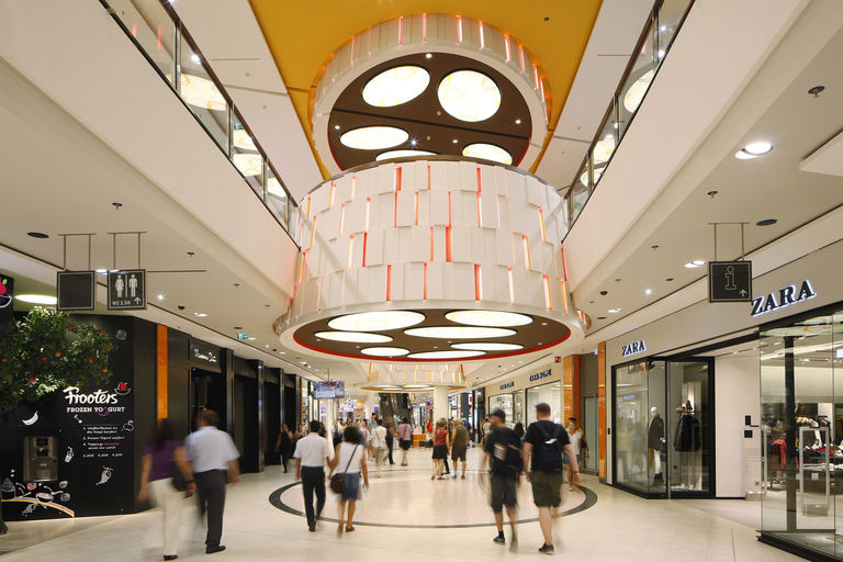 Interior design finishes and ceiling lighting at Skyline Plaza shopping centre in Frankfurt, Germany.