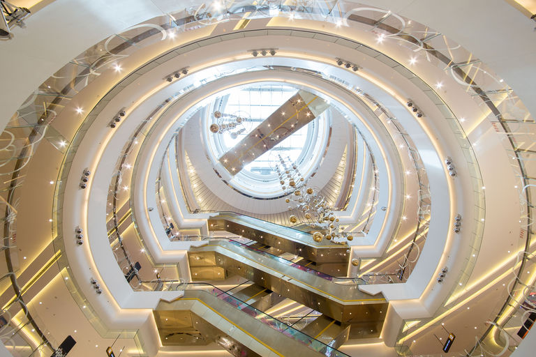 Atrium and five level escalator space at ID Mall in Hefei, China.