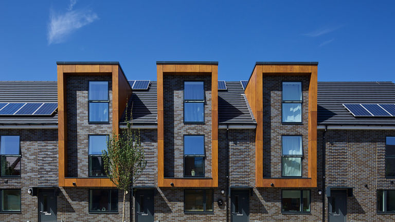 External facade detail and photovoltaic panels at Erith Park, London Borough of Bexley.