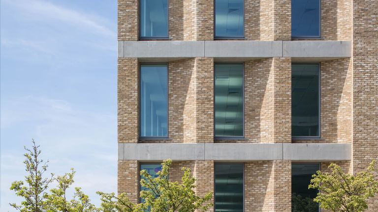 The recessed window facade of Victoria House in Milton Keynes, designed by Broadway Malyan