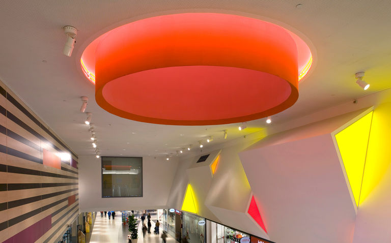 Brightly coloured features enhance the interiors at Valecenter in Marcon, Italy