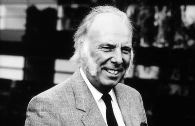 John Malyan in 1980 having been awarded an MBE for his services to architecture.