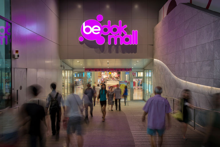 The Bedok Mall branding utilises a vibrant palette