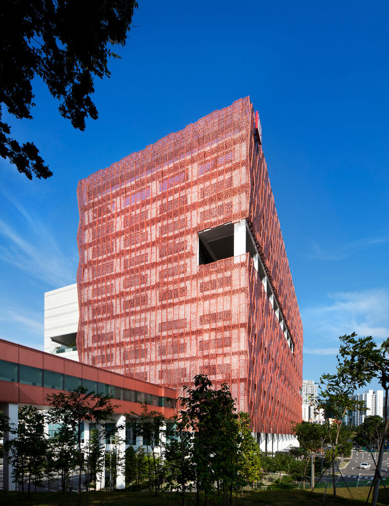 Exterior view of the National Heart Centre in Singapore, surrounded by greenery