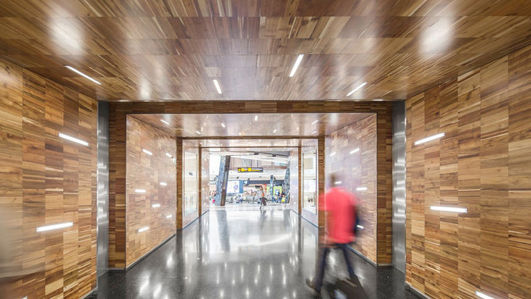 New timber interior finishes at newly refurbished Lisbon International Airport, Portugal.
