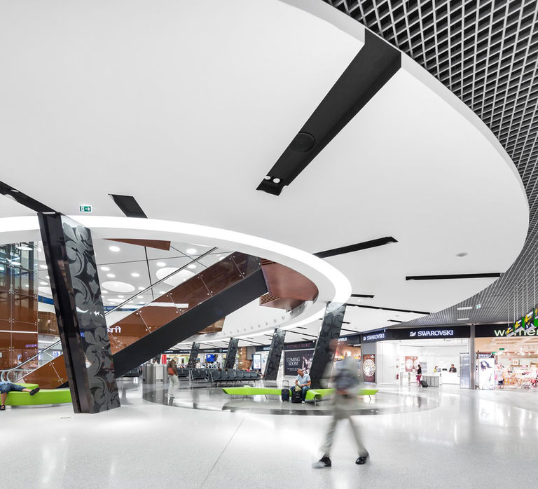 High quality retail units and interior finishes at the extension to Lisbon International Airport Terminal 1, Portugal.