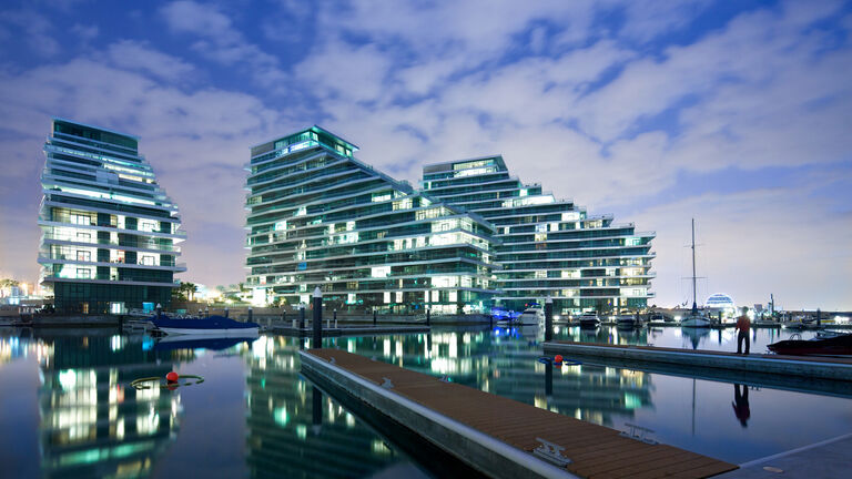 Night shot of Al Bandar residential apartment blocks