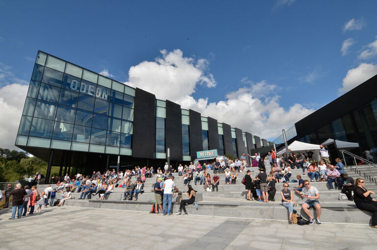 Feature glazed cinema building at Baron's Quay, a new retail and leisure quarter in Chester, UK.