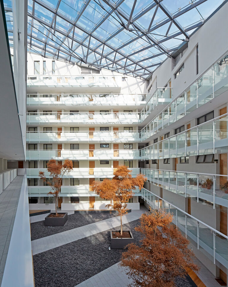 Internal balconies and courtyards within residential building at Mann Island in Liverpool.