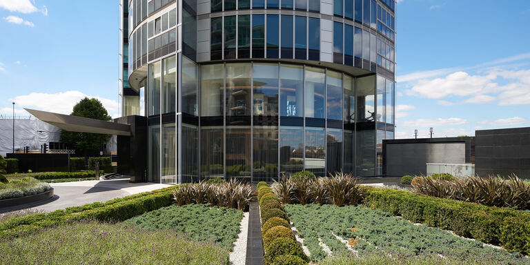 Ground level and landscaped gardens at The Tower, One St George Wharf in Vauxhall.