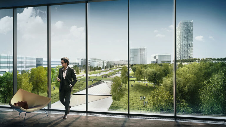 View over green spaces and landscaping at Warszama Główna mixed-use regeneration project in Warsaw, Poland.