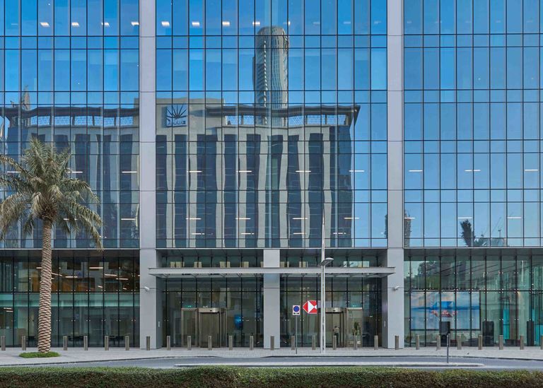 The reflective facade of the new HSBC HQ building in Dubai, designed by Broadway Malyan